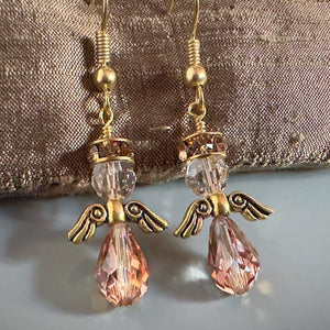 Swarovski crystal Christmas angel earrings at Suzie Q Studio, in various neutral colours, sparkly halo, gold wings and gold-tone ear wires.