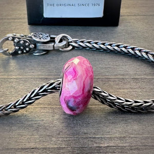 Available at Suzie Q Studio.com, Trollbeads, limited edition, pink, faceted, CRAZY LACE AGATE stone bead, on a silver chain with a clasp.