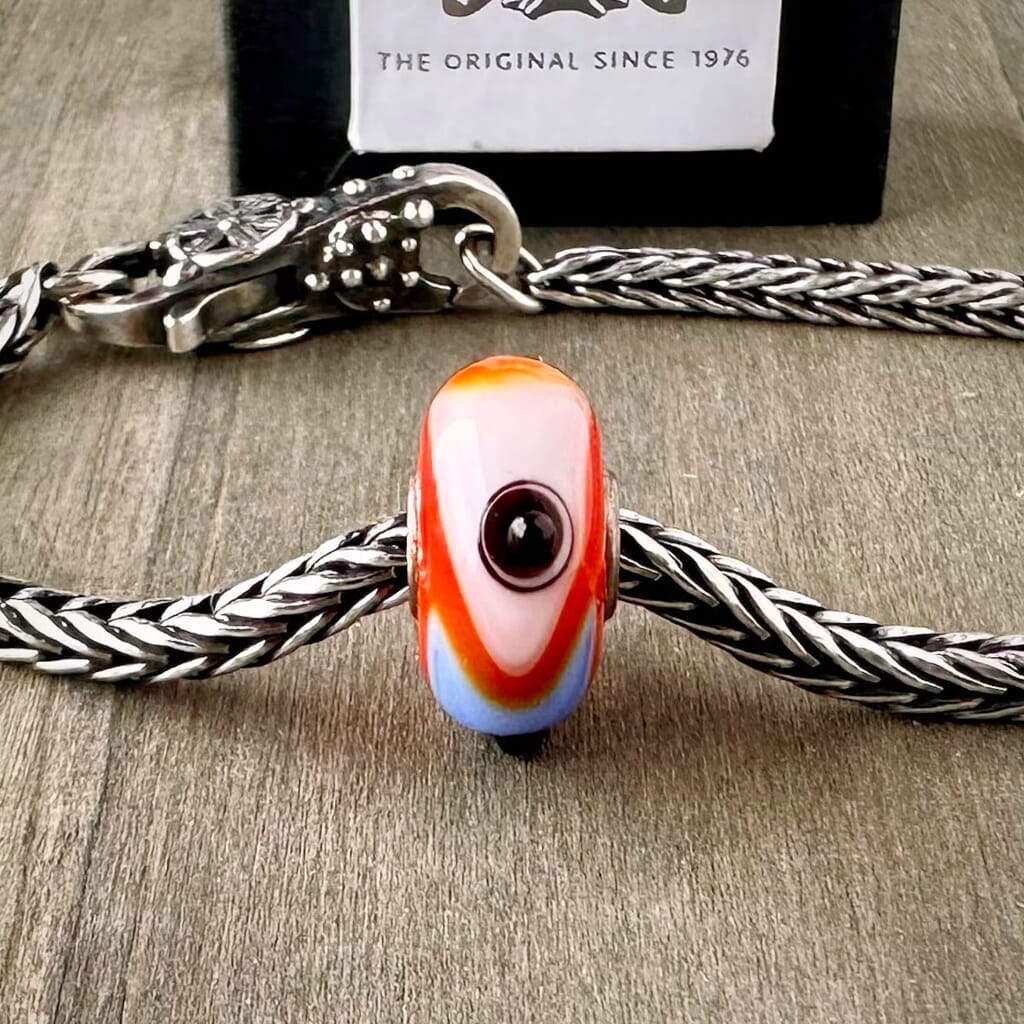 Suzie Q Studio's "Tibet" bead was part of the Trollbeads "Tibet Beads" Collection. This striking bead is a tribute to the colourful Tibetan culture. Check out Suzie Q Studio's entire collection of new, never worn Rare & Retired Trollbeads.