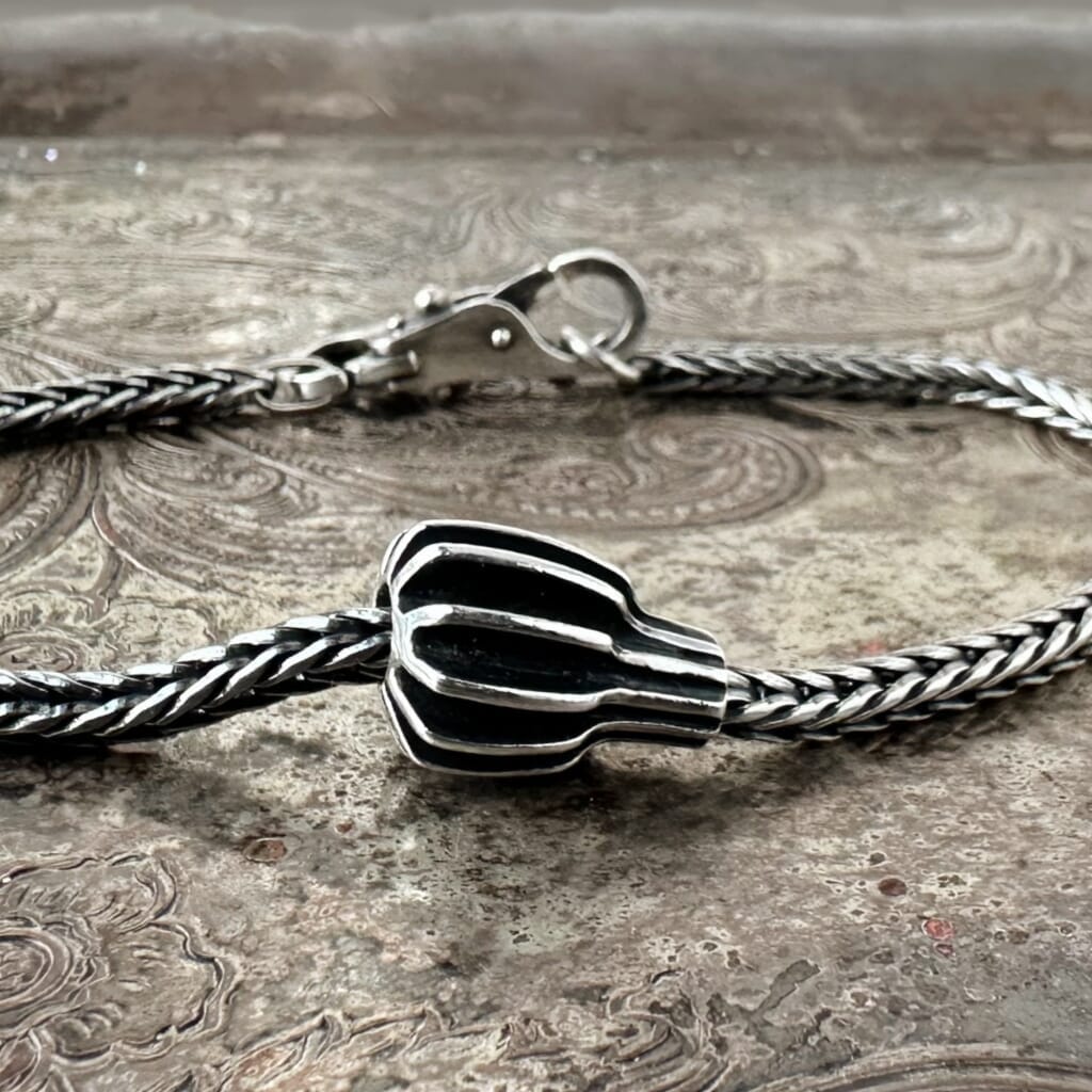 Suzie Q Studio's Trollbeads SILVER FRUIT is an ultra-rare, sterling silver bead that looks like an unusual geometric piece of dynamic fruit.  Be sure to check out Suzie Q Studio's entire collection of new, never worn Rare & Retired Trollbeads.